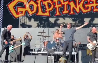 Tony Hawk sings Pro Skater song Superman on stage with Goldfinger