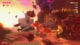 Donkey Kong smashing a rock enemy at sunset.